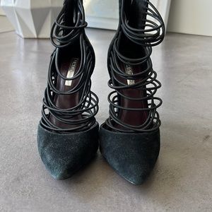 Faux suede, in good condition. Worn for dinner outings!